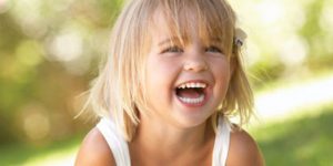 child with big smile